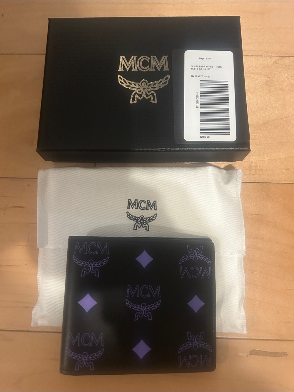 MCM Black Leather Bi-Fold Wallet with Purple Logo Motif